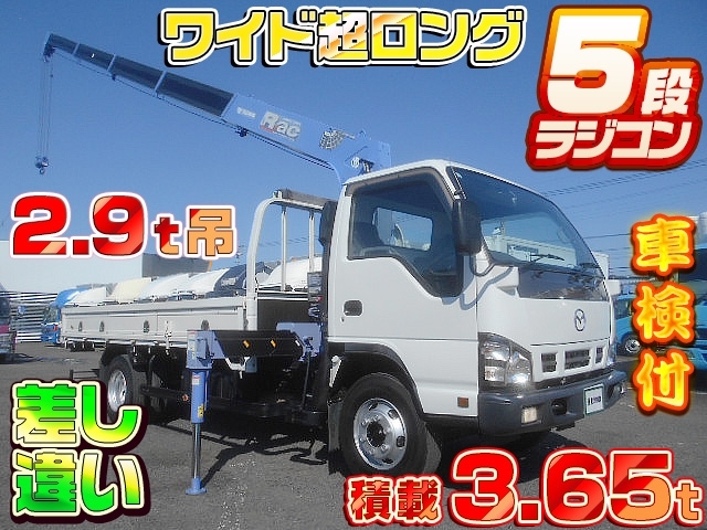 [クレーン付 平ボディ] H19 タイタン 5段ラジコン 2.9t吊 差し違いアウトリガー ワイド超ロング 積載3.65t 160馬力 車検付R8/4